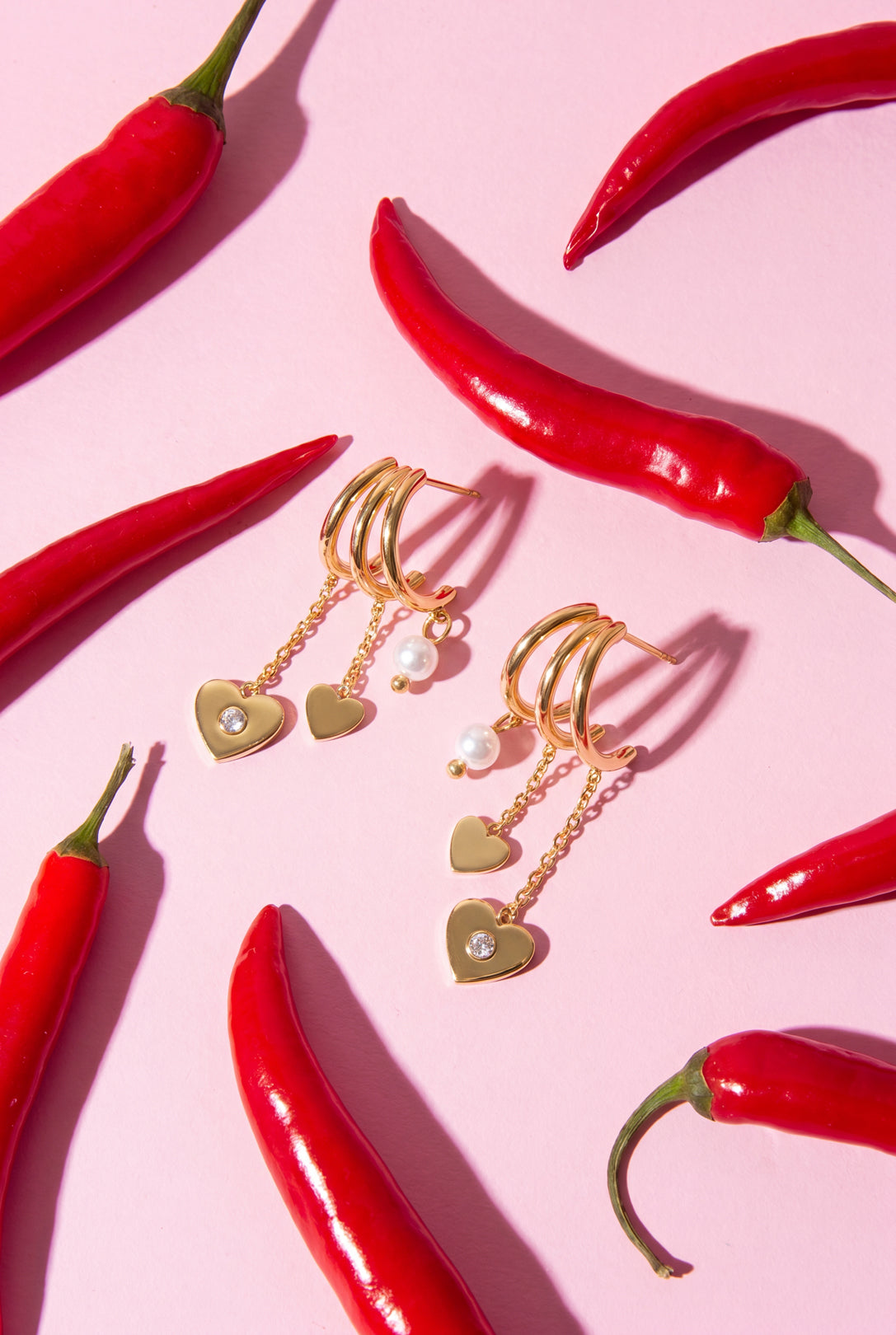 Stainless steel oorbellen met hart hangers en parel