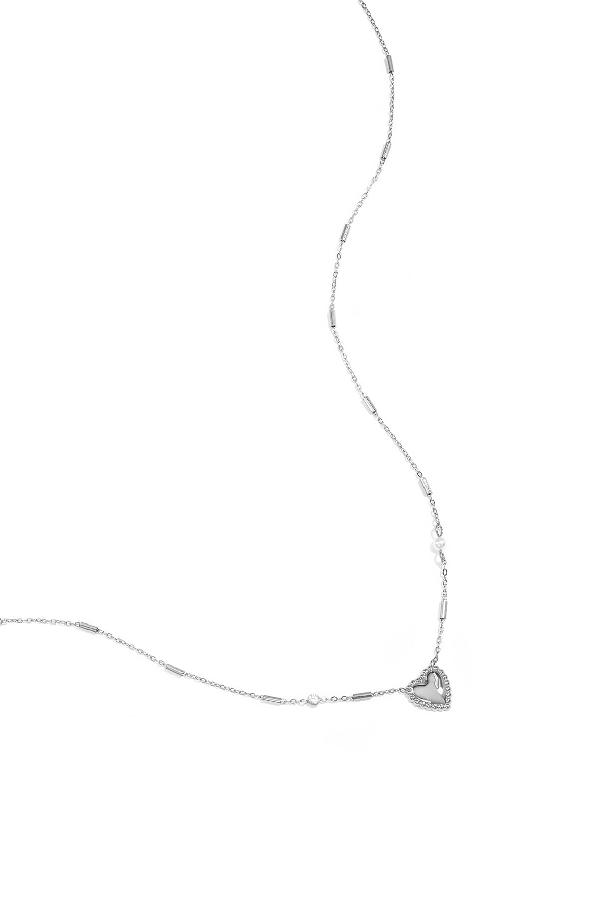 Ketting met parel, steentje en statement hart