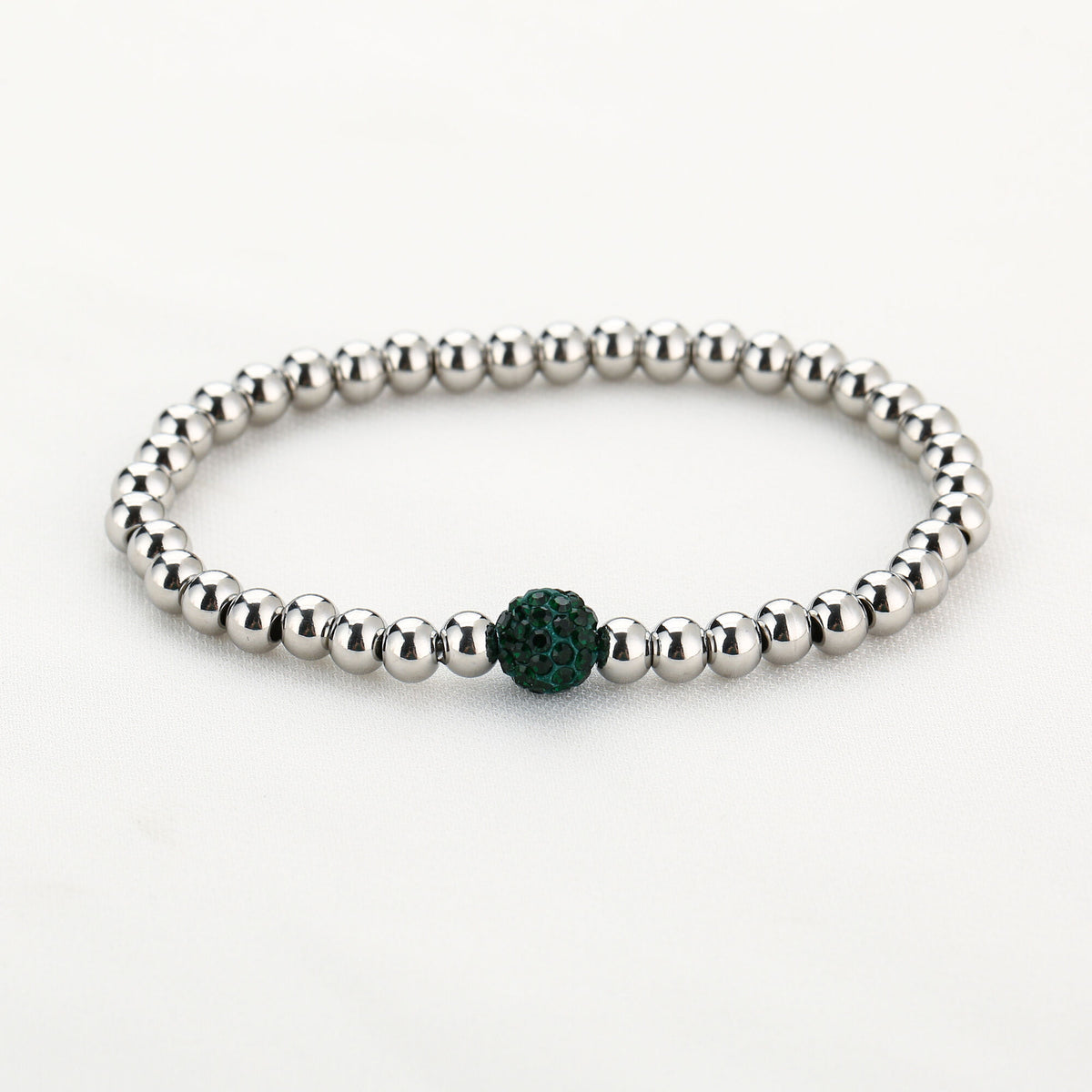 HZ Armband elastiek zilverkleur met groene kraal