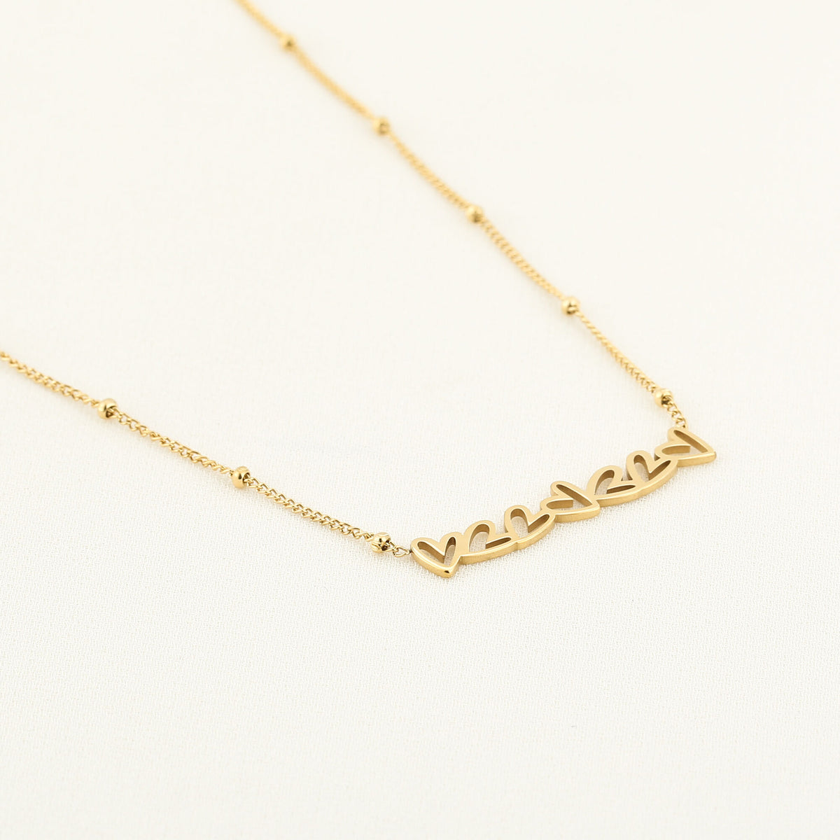 HZ Ketting 7 hartjes - stainless steel zilver of goud