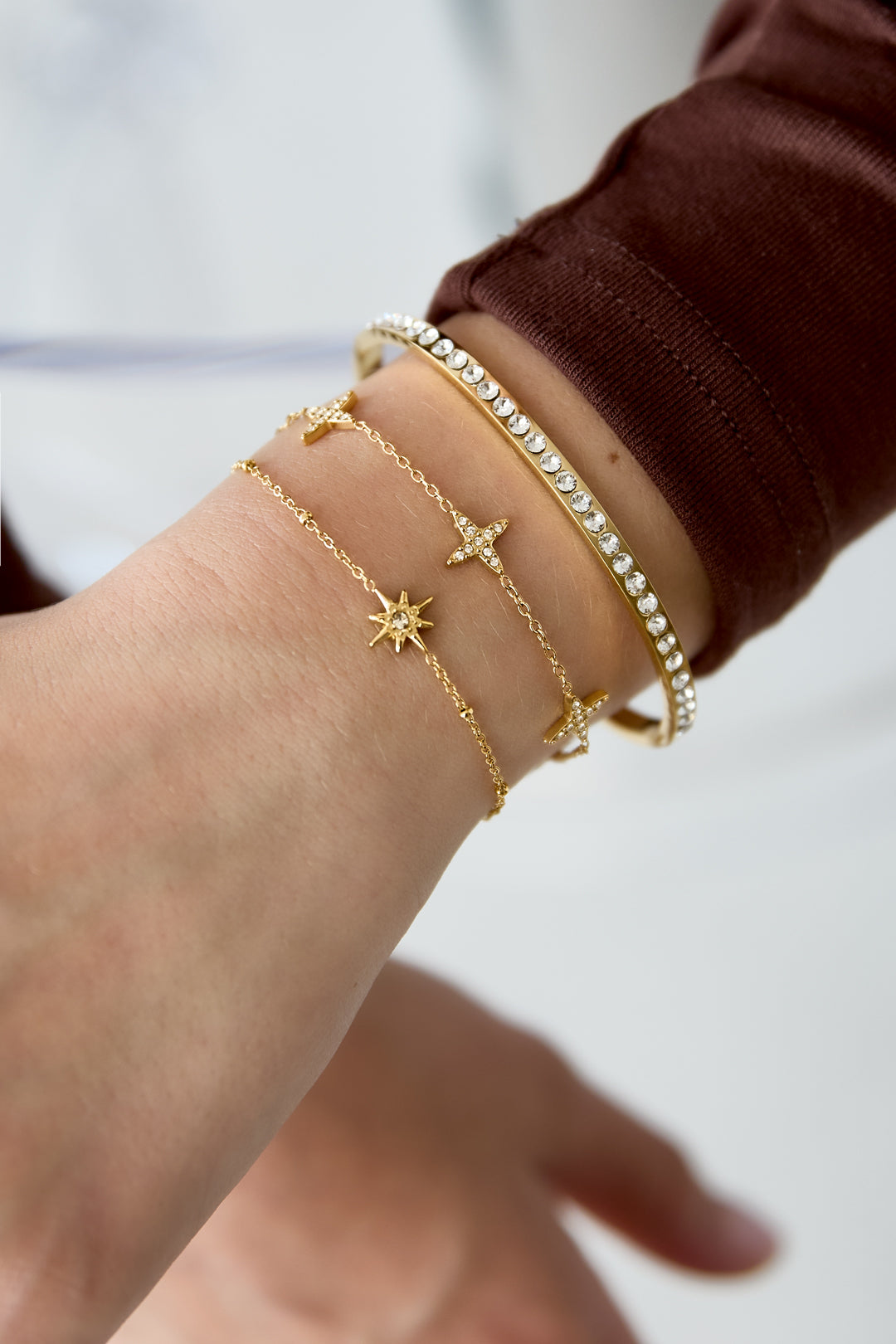 Armband met klavermotief en belegde klavers