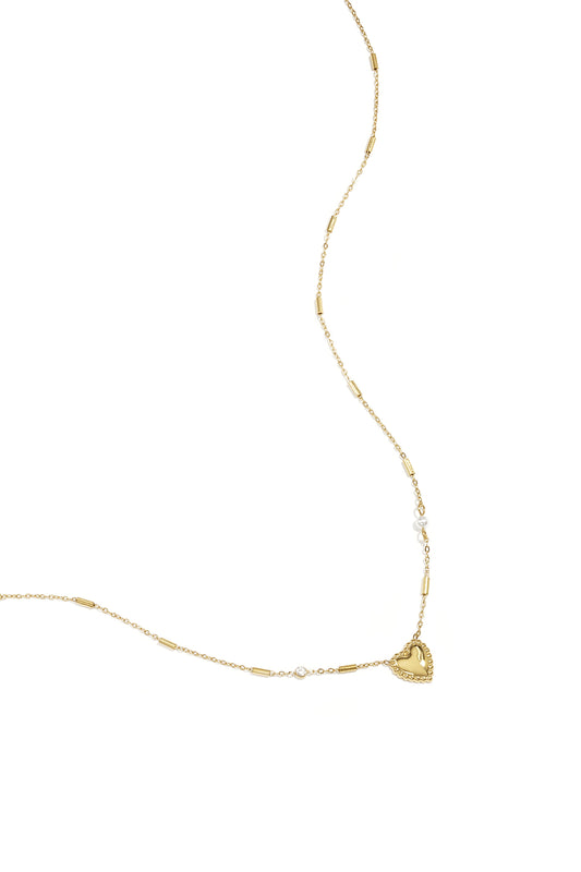Ketting met parel, steentje en statement hart